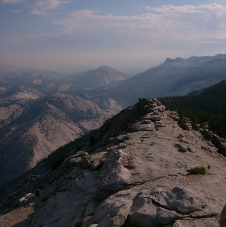 a rocky hiking path at the summit of Clouds Rest